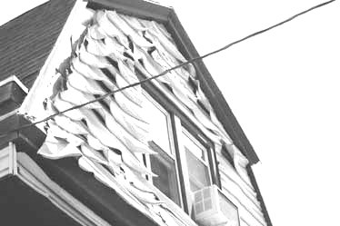 Melted Vinyl Siding from fire across street